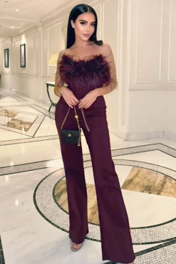 Tessa | Burgundy Shaped Neckline Corset Jumpsuit With Feather Trim Detail