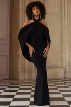 Revelation | Black Crossed Halter-Neck Fishtail Maxi Dress With Cape